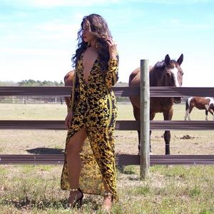 Long sleeved maxi dress with ring detail